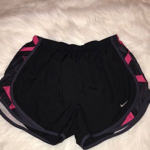 Black and hot pink nike shorts